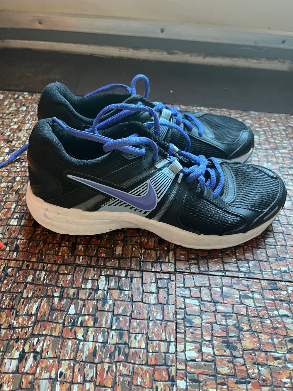 Nike Men's Black Running Shoes with Blue Accents